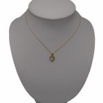 Halskette aus 14-karätigem Gold mit einem kleinen Herzanhänger