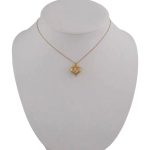 Anhänger aus 14-karätigem Gold, gewölbtes Herz, mit Kreuzbändern