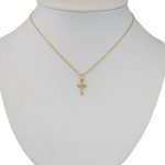 Anhänger aus 14-karätigem Gold, verziert mit einem Kreuzkristall