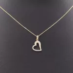 Herzanhänger aus 14-karätigem Gold mit Kristallen