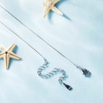 Ezüst női nyaklánc csikóhalmedállal