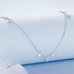 Ezüst női nyaklánc csillagokkal és gyöngyökkel