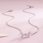 Ezüst nyaklánc masnimedállal