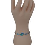 Silberarmband mit modernen Linien und blauen Intarsien