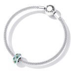 Ezüst charm, lótusz mintával