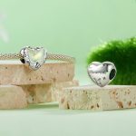 Ezüstcharm, szív pillangóval