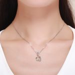 Ezüst charm (925), kismadár virágokkal