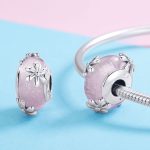 Ezüst charm virággal