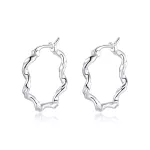 Ezüst fülbevaló, hullámos