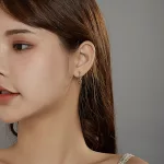 Ezüst fülbevaló, hullámos