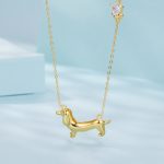 Ezüst nyaklánc tacskómedállal, aranyozott