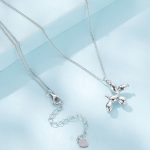 Ezüst női nyaklánc uszkármedállal