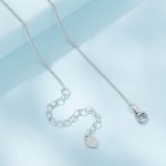 Ezüst női nyaklánc uszkármedállal